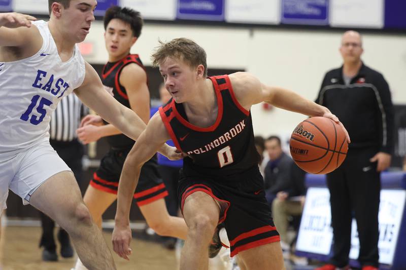 Bolingbrook’s Trey Brost works the ball against Lincoln-Way East on Tuesday, Dec.12th, 2023 in Frankfort.