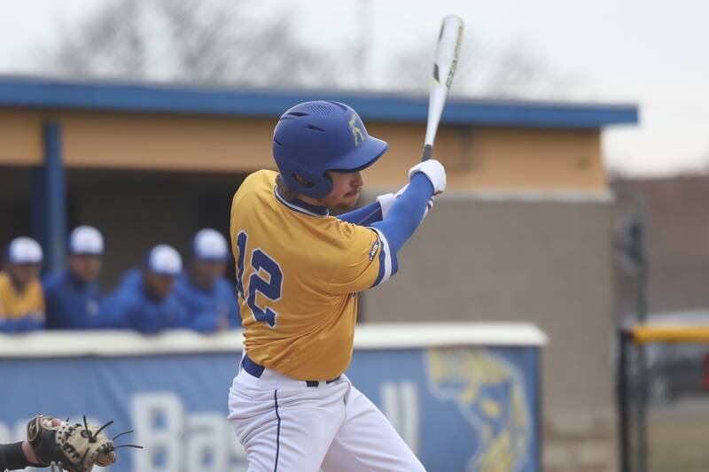 Joliet Central’s Zach Riley singles against Bolingbrook on Tuesday, March 21st. 2023.