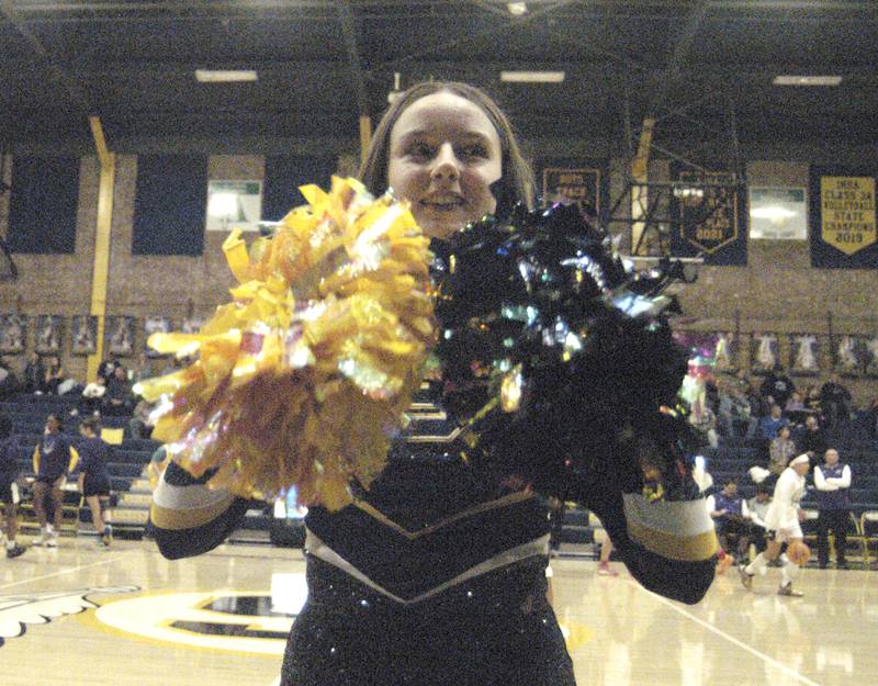 Freshman Pom Ronni Oyen gets the crowd going. Sterling Golden Warriors faced off against Plano Lady Reapers in an IHSA 3A Regional girls final at Musgrove Fieldhouse in Sterling on February 20, 2025. Sterling won the game 70-38.