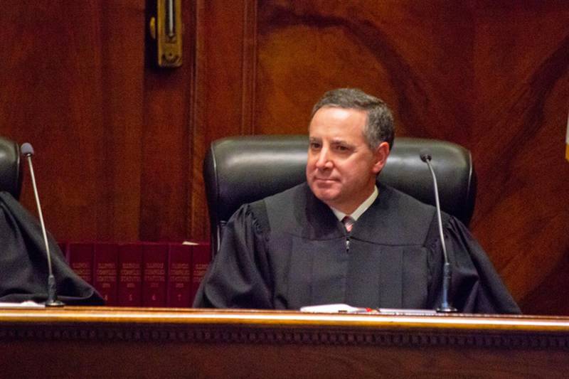 Illinois Supreme Court Justice David Overstreet is pictured in a file photo in the Supreme Court chamber. He authored a unanimous opinion upholding the state’s lifetime residency restrictions for child sex offenders.