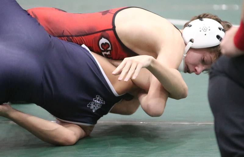 Amboy's Aden Spinelli wrestles Lisle's Sebastian Lara in the 106 pound weight class during the Class 1A Regional meet on Saturday, Feb. 8, 2025 at St. Bede Academy.