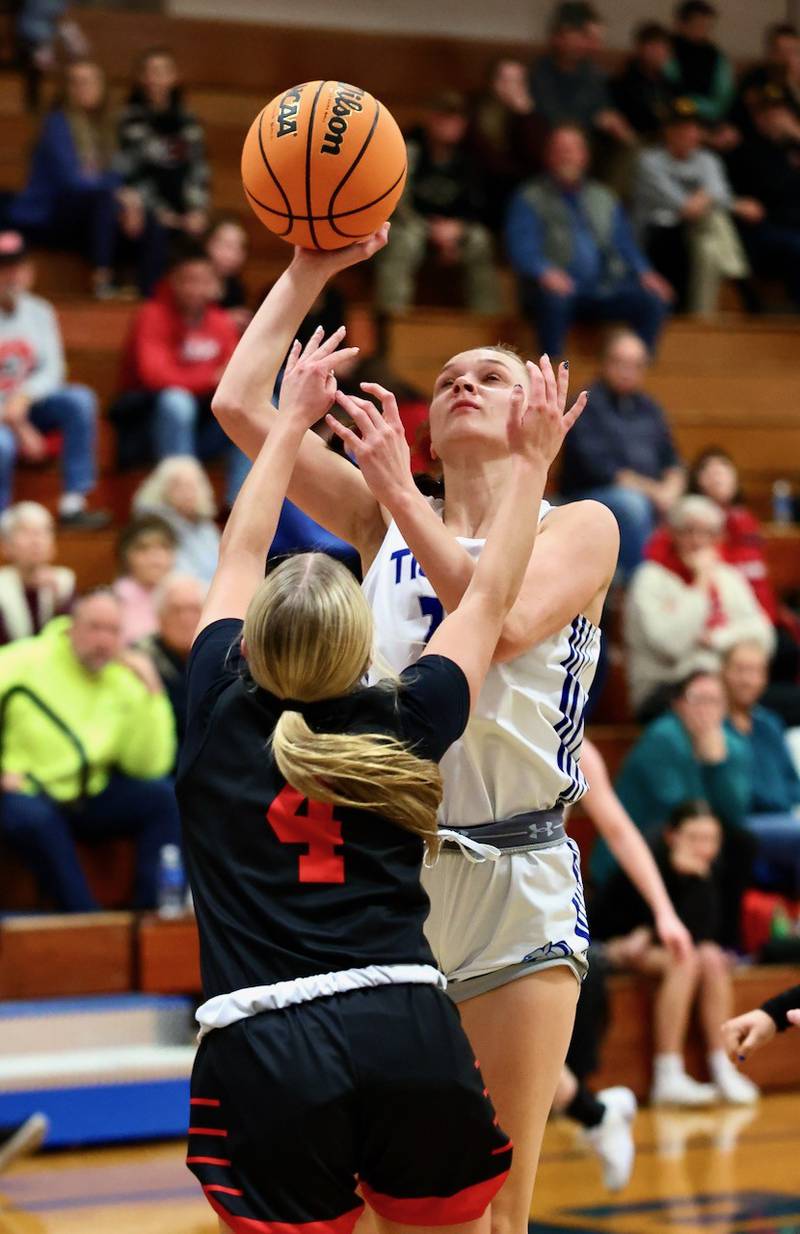 Princeton's Keighley Davis shoots over Hall's Charlie Pellegrini in Tuesday's game at Prouty Gym. The Tigresses won 41-39.