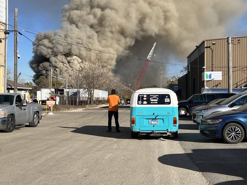 Smoke billows from a burning pile of wood and metal near Industry Avenue in Joliet at BL Duke Scrap Metal Recycling Yard on Friday, Nov. 1, 2024. The Joliet Fire Department said the fire did not pose a risk to the public.