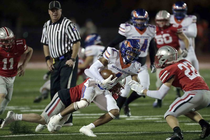 Hoffman EstatesÕ Xavier Martnez, (4) looks to move the ball upfield Friday October 21, 2022 in Palatine.