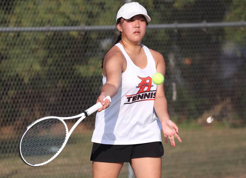 DeKalb’s Jolie Ni hits a forehand during her match against Sycamore Wednesday, Sept. 18, 2024, at Sycamore High School.