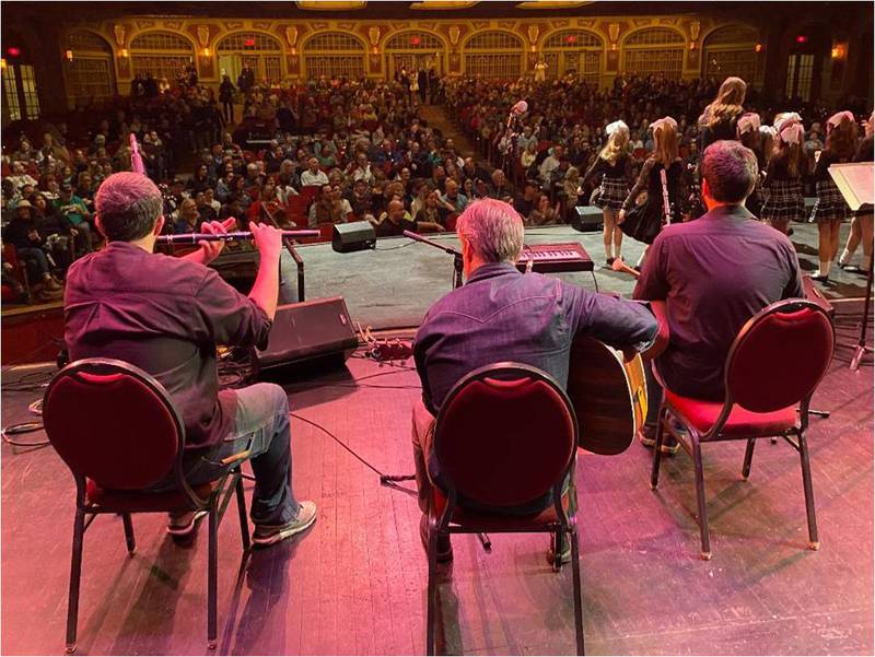 Three musicians perform at an Irish session at the Rialto Square Theatre in Joliet in 2022 for "A Shamrockin' Good Time." The musicians are, from left: Joe Nielson, Gavin Coyle and Max Dunne. All three are part of the lineup for the 2023 show on March 16.