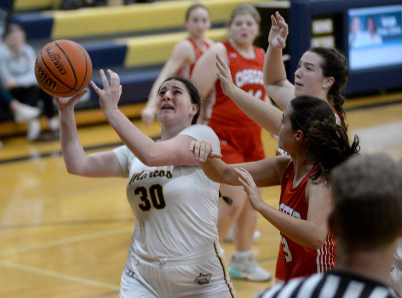 Polo's Leah Tobin (30) shoots against Oregon during Tuesday, Dec. 5, 2023 action at Polo High School.