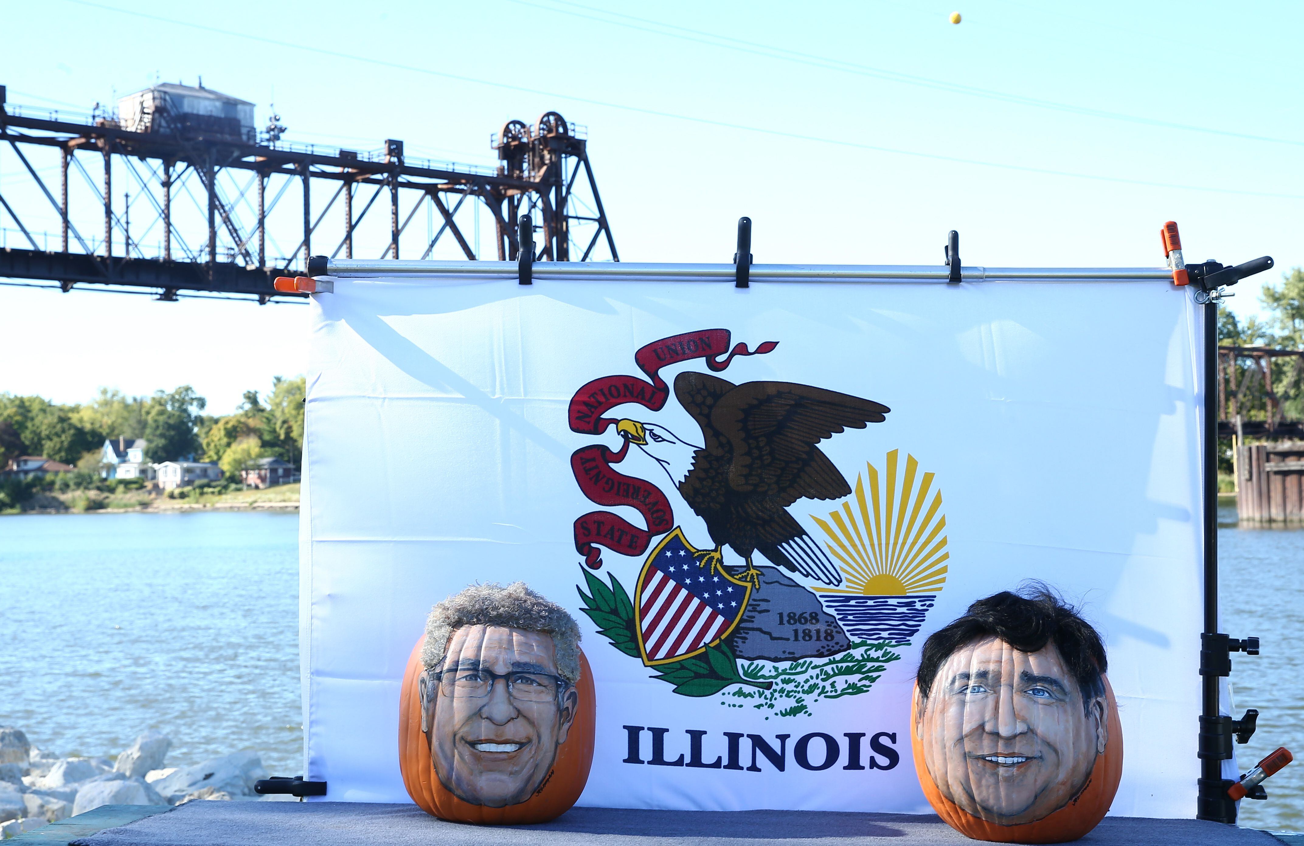 Pop artist John Kettman, of La Salle, said he created the gubernatorial candidates on pumpkins to bring people a smile during the election season.