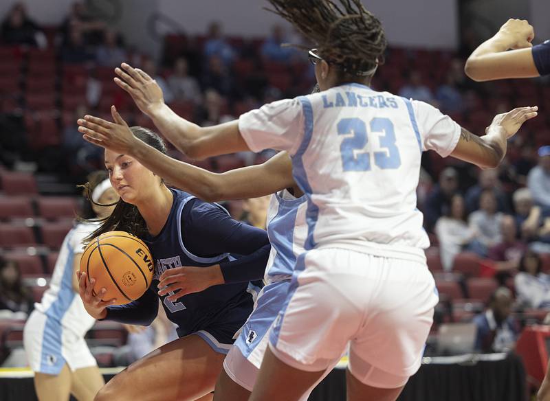 Nazareth's Samantha Austin works below the basket against Belleville East Friday, March 6, 2026, in the Class 4A girls state semifinal game at CEFCU Arena at ISU.