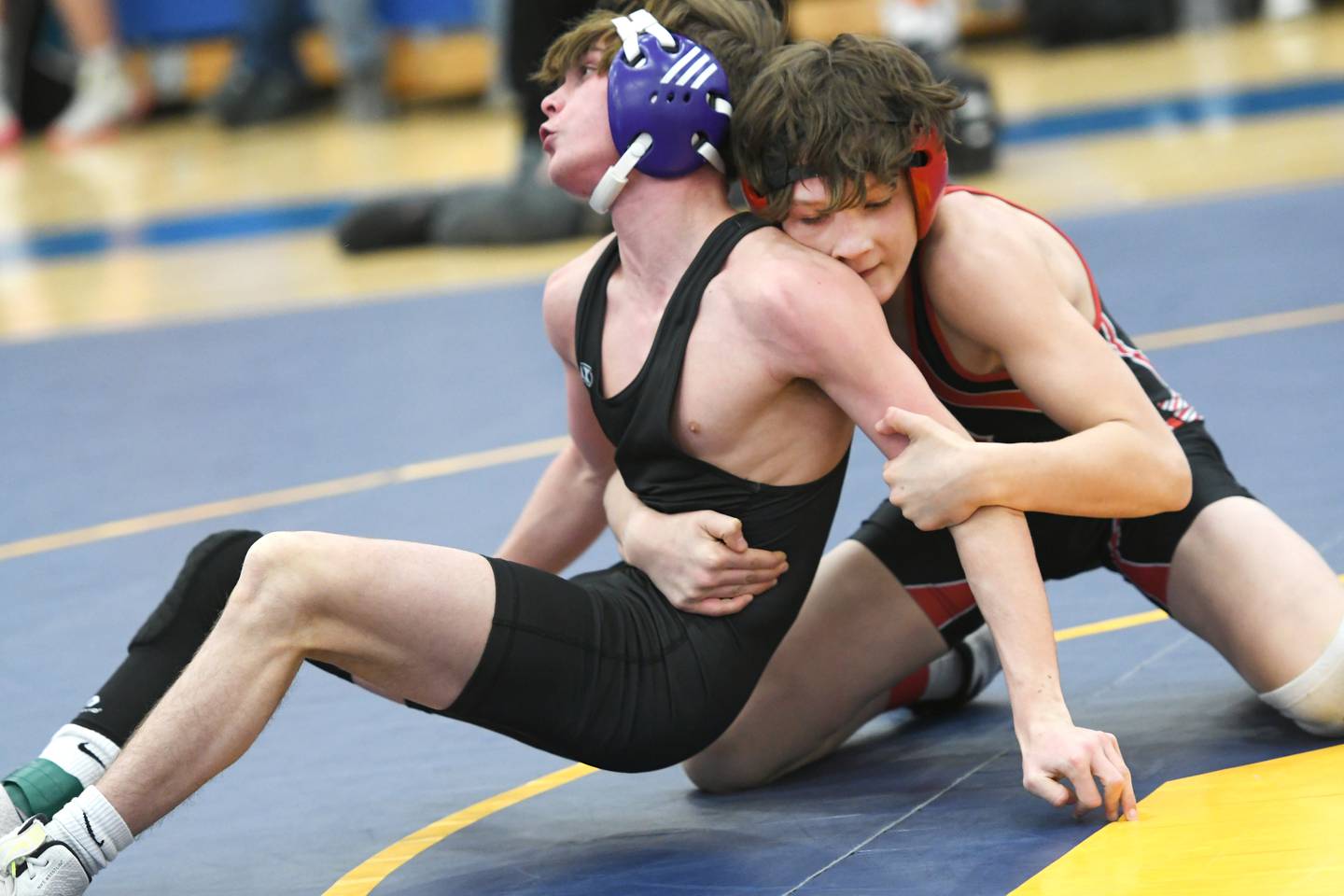 Amboy's Landon Blanton (right) wrestles Dixon's Ayden Rowley for the 113-pound championship at the 1A Polo Wrestling Regional held at Eastland High School in Lanark on Saturday, Feb. 4.