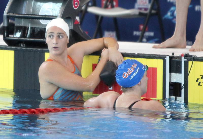 U.S. Olympic Swim Team members Leah Smith and Katie Ledecky complete the 400-meter freestyle as part of the Tyr Pro Swim Series Westmont at the FMC Natatorium in Westmont Thursday, March 3, 2022. The meet continues through Saturday.