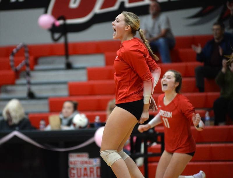 Oregon's Skylar Bishop (5) and Anna Stender (11) celebrate a win over Stillman Valley on Thursday, Oct. 17, 2024 at Stillman Valley.