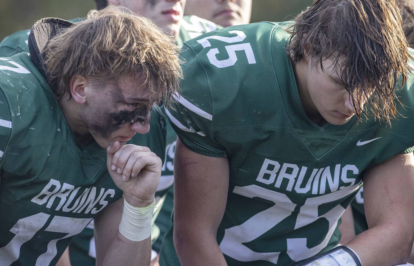 St. Bede players Nathan Lough (17) and Landon Jackson (25) react after being defeated by Forreston during the Class 1A first round playoff game on Saturday, Oct. 29, 2022 at the Academy in Peru.