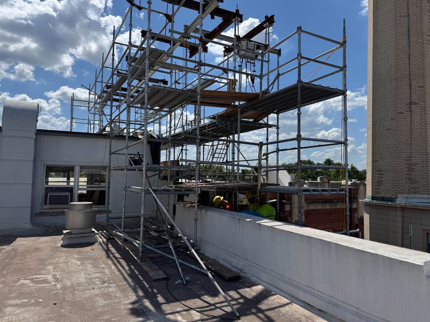 Parapet along the east side of the LTHS Central campus roof being reconstructed in July 2025.