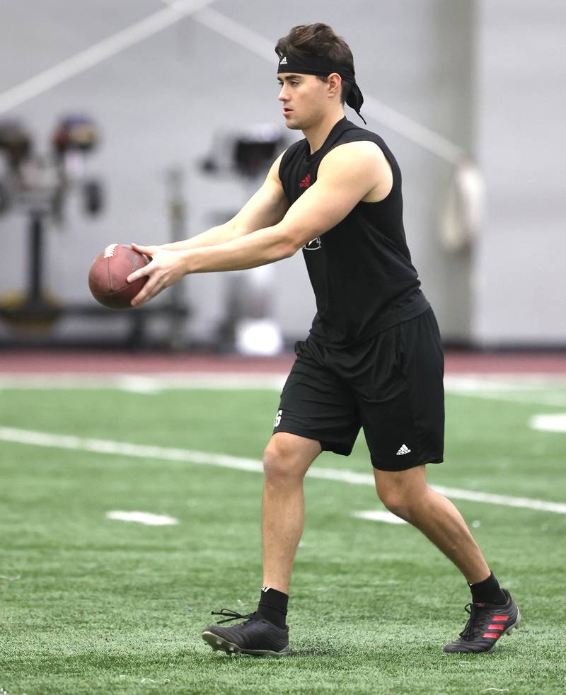 Former Northern Illinois University punter Matt Ference works out Wednesday, March 30, 2022, during pro day in the Chessick Practice Center at NIU. Several NFL teams had scouts on hand to evaluate the players ahead of the upcoming draft.