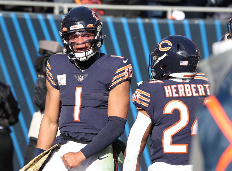 Chicago Bears quarterback Justin Fields celebrates his touchdown run in the first half of  their game against the Lions Sunday, Nov. 13, 2022, at Soldier Field in Chicago.