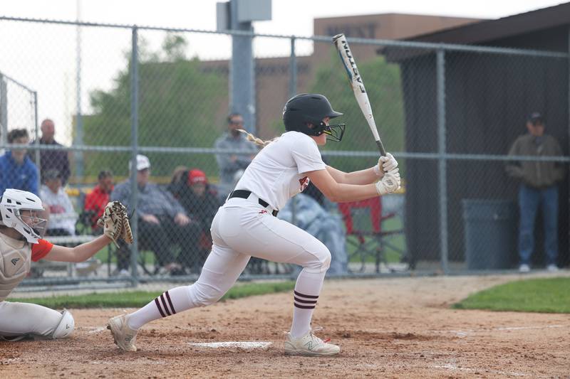 Lincoln-Way Central’s Kayla Doerre connects for a single against Lincoln-Way West on Tuesday, May 14, 2024 in New Lenox.