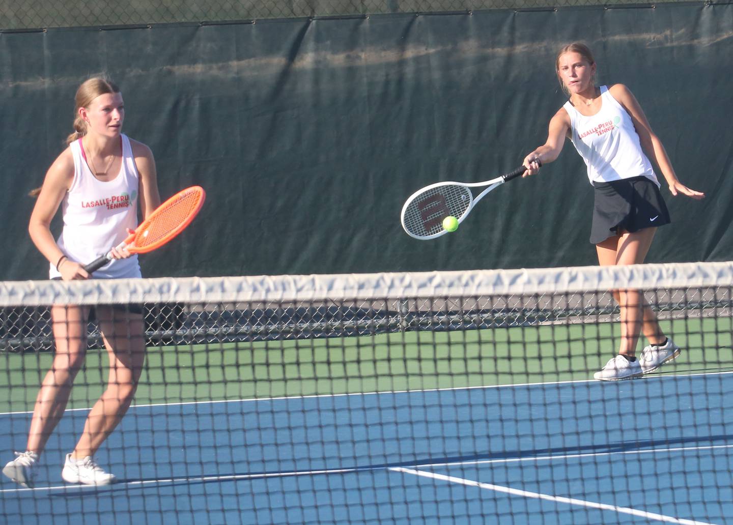 L-P number one doubles team members April Pescetto and Addi Piecha play tennis on Tuesday, Sept. 16, 2025 at Ottawa High School.
