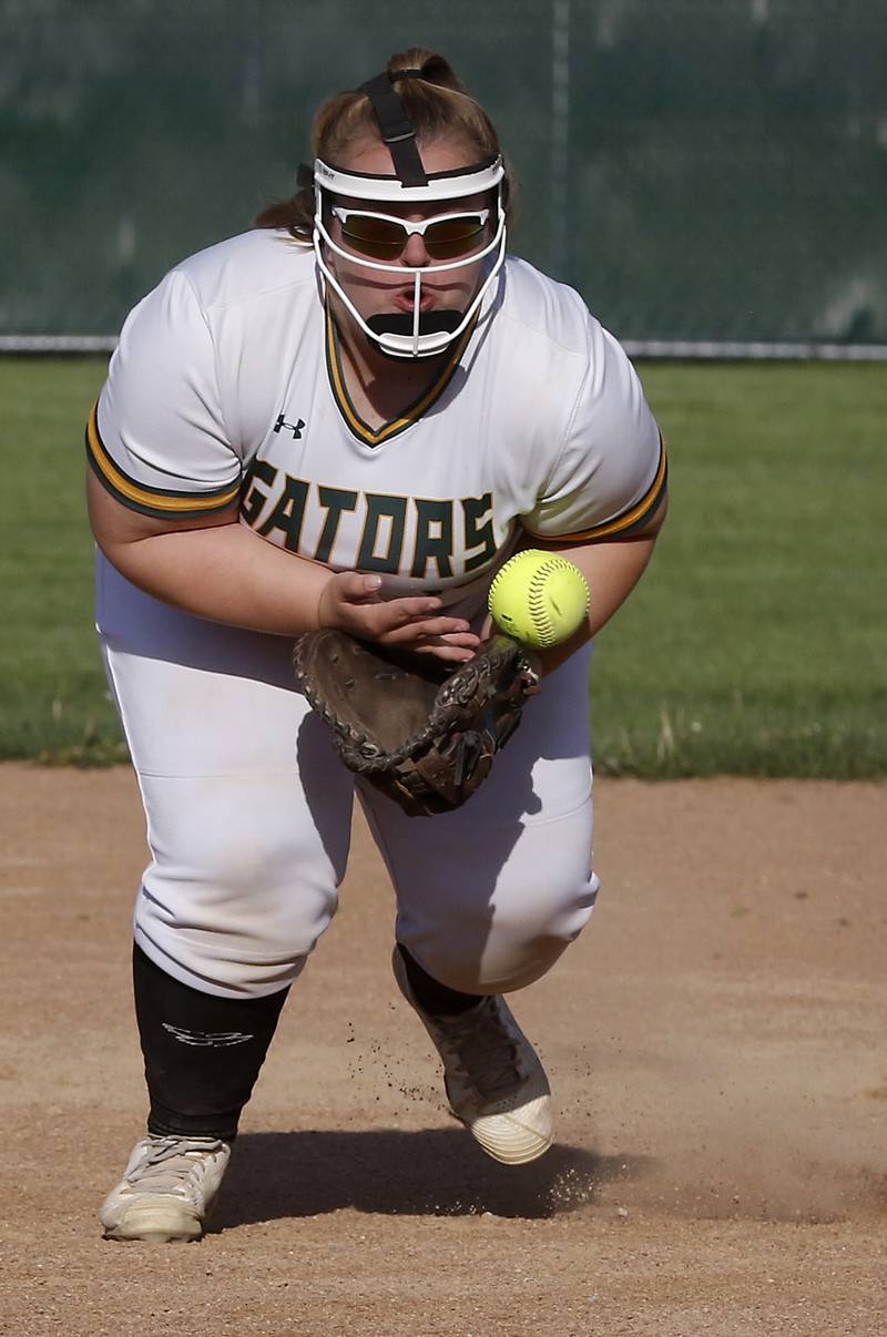 Crystal Lake South's Molly Cook tries to come up with the ball during a Fox Valley Conference softball game Monday, May 16, 2022, between Crystal Lake South and Burlington Central at Crystal Lake South High School.