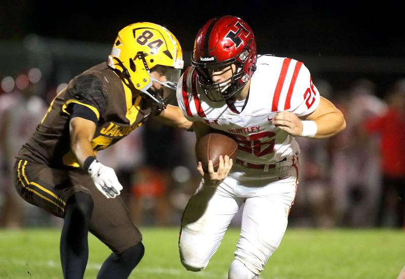 Huntley’s Chase Hojnacki runs the ball in varsity football at Jacobs High School in Algonquin on Friday, Sept. 26, 2025.