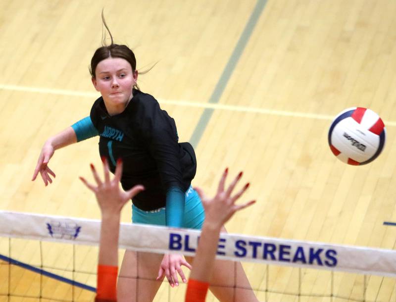 Woodstock North’s Tayler Menzel sends the ball over the net against Crystal Lake Central in IHSA girls volleyball Class 3A Regional action at Woodstock High School in Woodstock on Thursday, October 30, 2025.