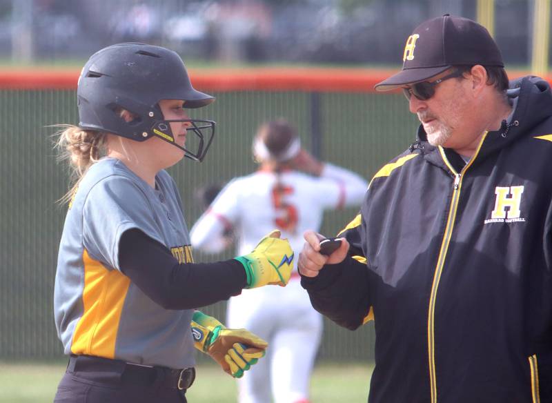 Harvard’s Emma Ribar arrives safely at first base in varsity softball at Crystal Lake Central High School in Crystal Lake on Monday, May 19, 2025.