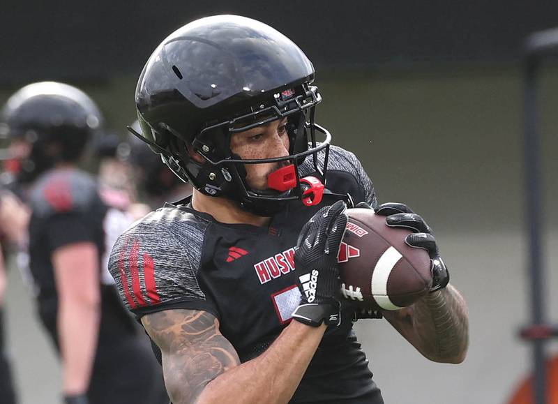 Northern Illinois University wide receiver Cam Thompson makes a catch Tuesday, April 14, 2026, during a drill at spring practice in Huskie Stadium at NIU in DeKalb.