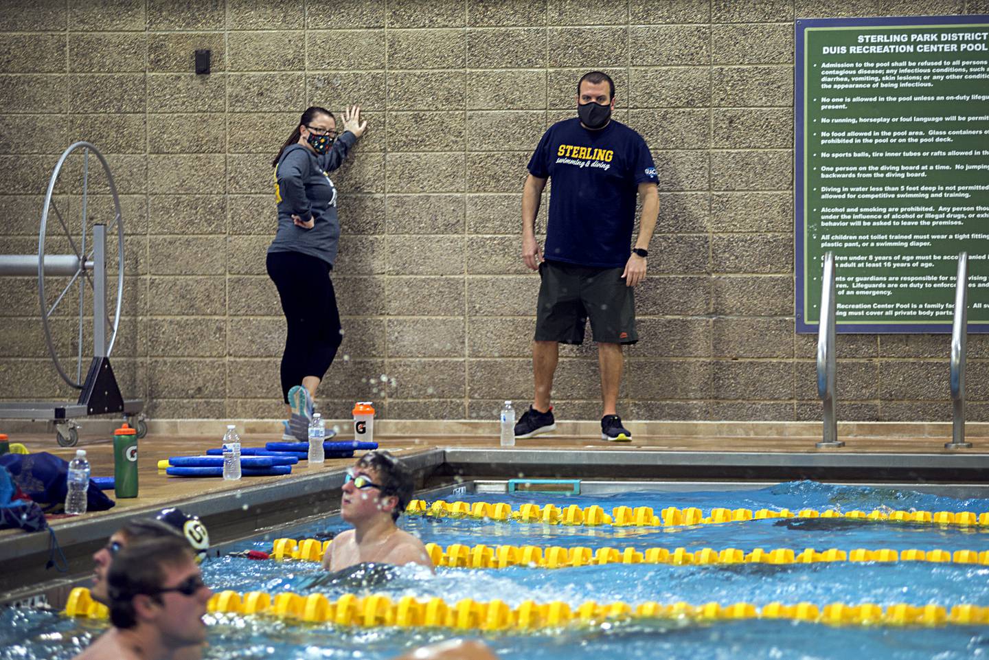 Sterling swimming coaches Jordan Johnson and Kyle Ruiz run practice at the Duis Center in 2021.