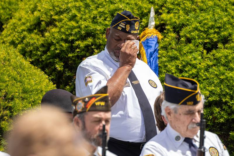 Clifton Cradle wipes eyes at the annual Memorial Day service on Monday, May 26, 2025 at Valley Memorial Park in Spring Valley.