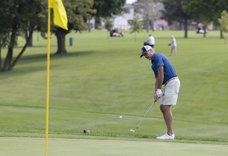 Trent Eddy chips onto the 3rd green Sunday, July 21, 2024 during the final round of the 102nd Lincoln Highway golf tournament. The tournament was held at Emerald Hill in Sterling.
