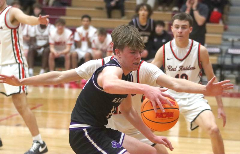 Hampshire’s Tyler Lacke moves the ball in varsity boys basketball on Friday, Dec. 19, 2025, at Huntley High School in Huntley.