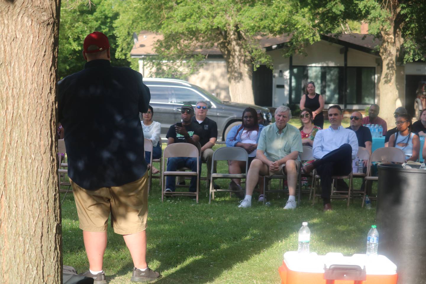 Chad Glover, executive director at Opportunity DeKalb, speaks to the crowd during the Breakthrough Community Business Academy launch event June 18, 2024 at Welsh Park in DeKalb.