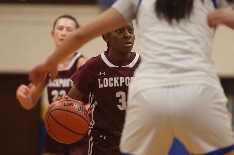 Lockport’s Brooke Sartin looks for a play against Joliet Central.