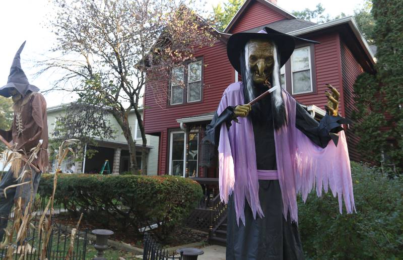 A giant spooky tall witch stands outside a home in the 800 block of Ottawa Avenue on Thursday, Oct. 12, 2023 in Ottawa.