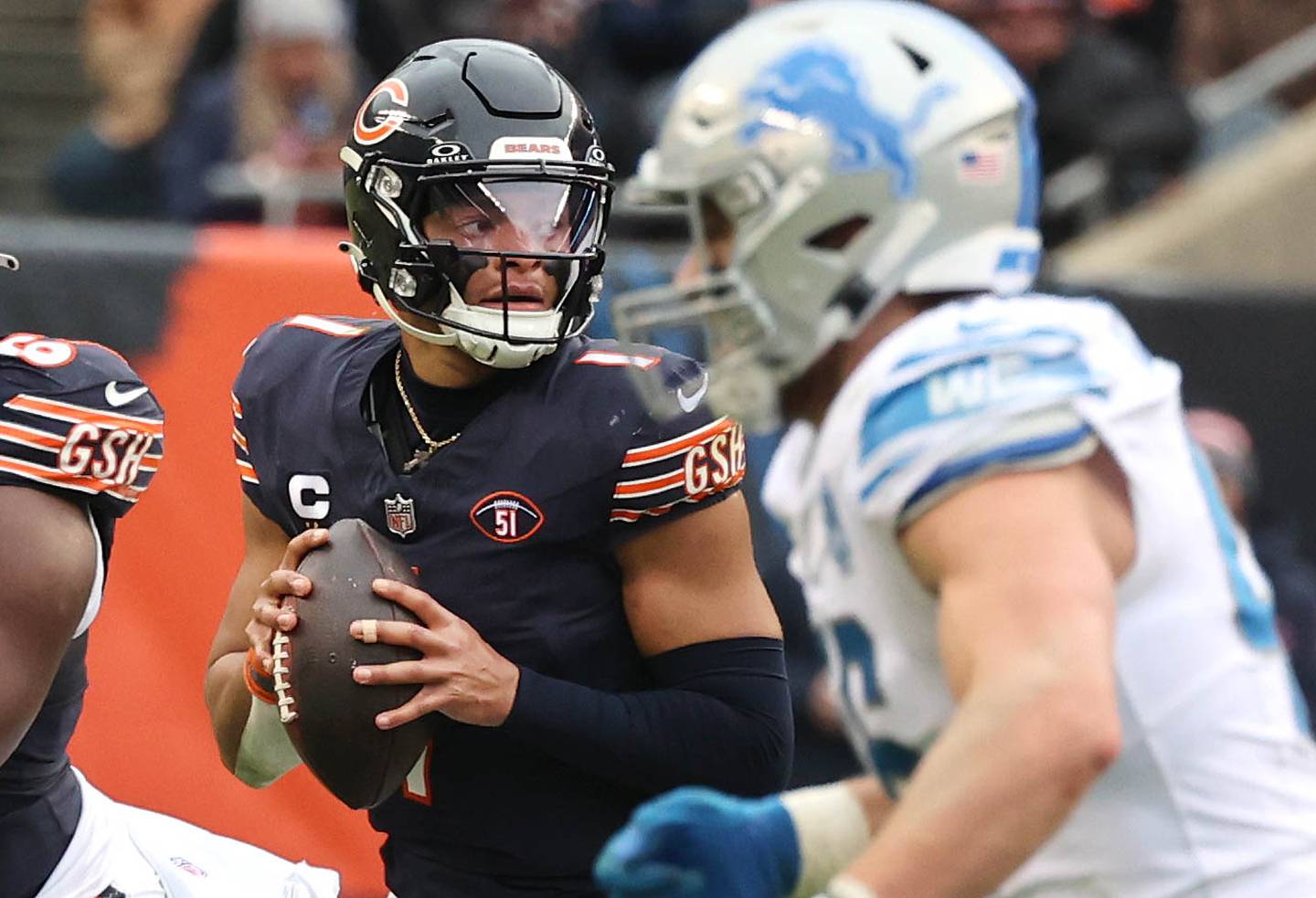 Chicago Bears quarterback Justin Fields looks for a receiver in the Detroit Lions secondary during their game Sunday, Dec. 10, 2023 at Soldier Field in Chicago.