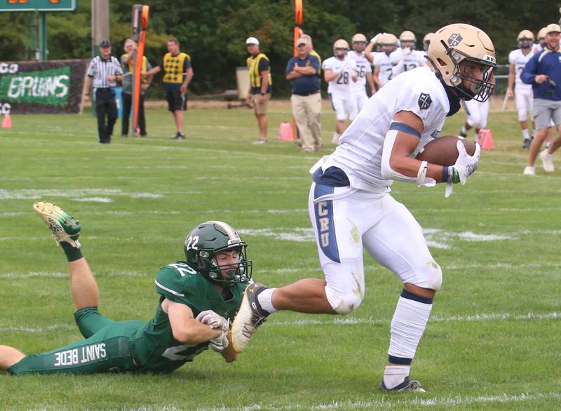 Marquette's Blayden Cassell scores a touchdown on this throw as St. Bede's Ryan Nawa fails to make the tackle during the Homecoming game on Saturday, Sept. 28, 2024 at St. Bede Academy.