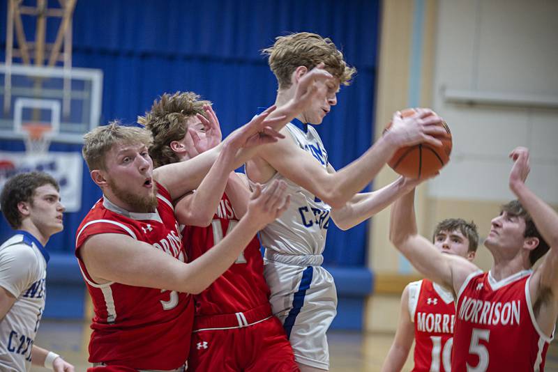 Newman’s Lucas Simpson hauls down a rebound Monday, Feb. 14, 2022 against Morrison.