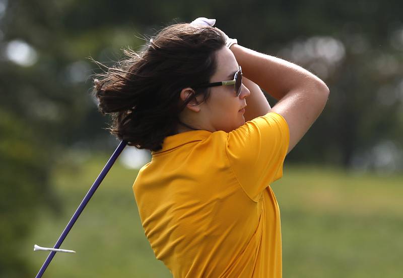 Jacob’s Kayla Doetsch watches her tee shot on the second hole during the Fox Valley Conference Girls Golf Tournament Wednesday, Sept. 21, 2022, at Crystal Woods Golf Club in Woodstock.