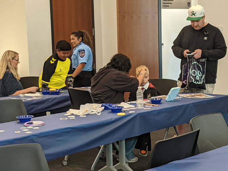 Children get their faces painted at the joint safety campus open house of the Oswego Fire Protection District and Oswego Police Department on Oct. 11, 2025.