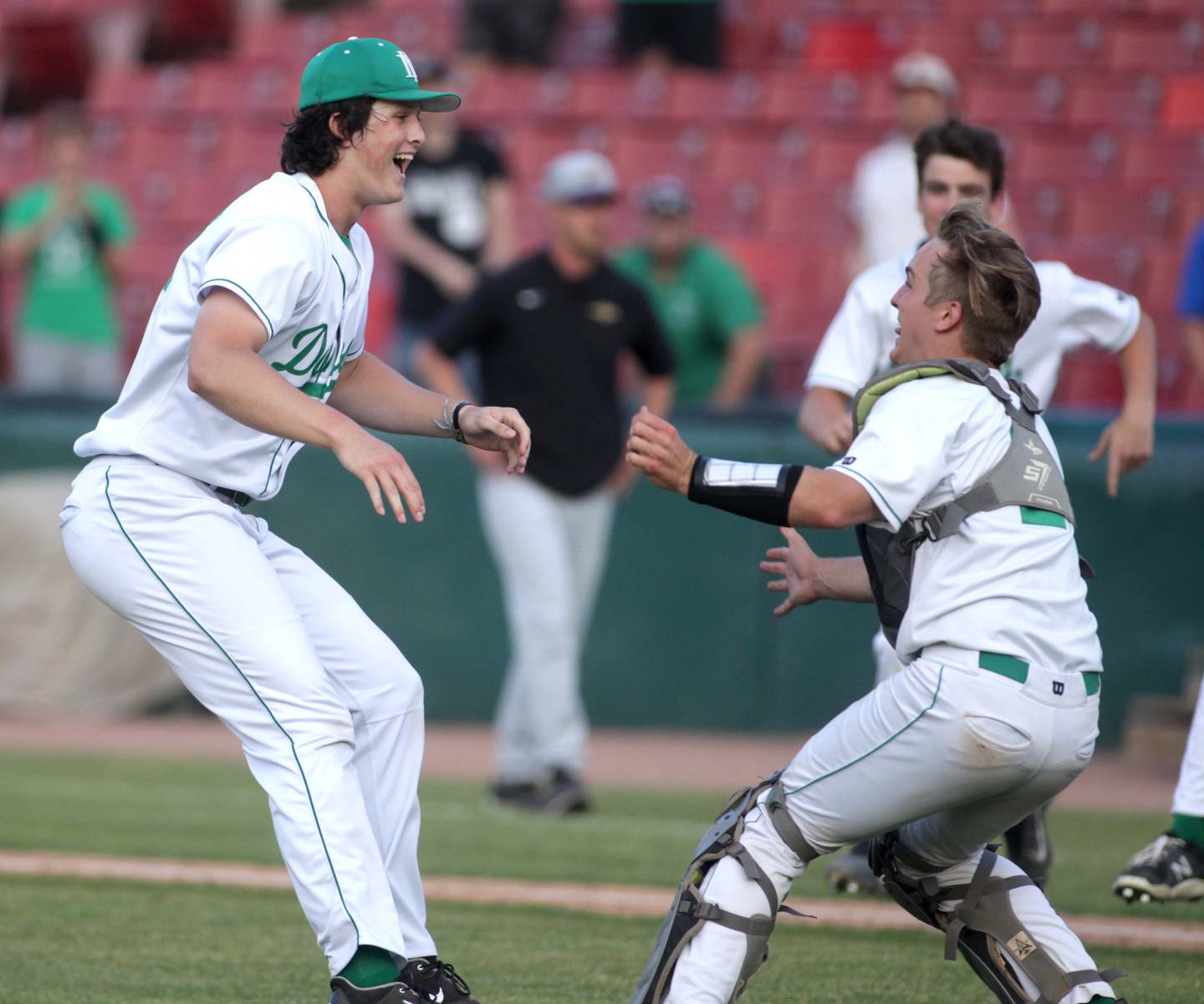 York pitcher Ryan Sloan and catcher Jack Rozmus celebrate their win and Sloane’s no-hitter in the Class 4A Kane County Supersectional against Hononegah at Northwestern Medicine Field in Geneva on Monday, June 5, 2023.