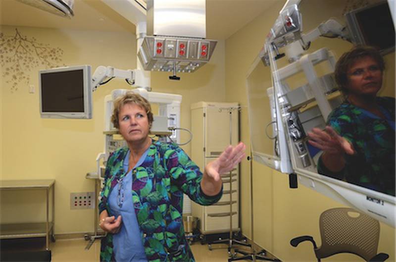 Surgery Director Kathy Schafer points out one of several monitors in a new KSB outpatient surgical room Thursday. The hospital will have a ribbon-cutting ceremony and open house Sunday for its new emergency room and outpatient wing. The $16 million project expanded the area by 30,000 square feet.