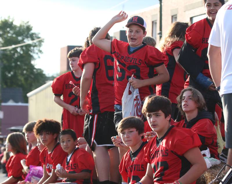 Hall football players ride a float during the Hall High School Homecoming parade on Thursday, Sept. 28, 2023 in Spring Valley.