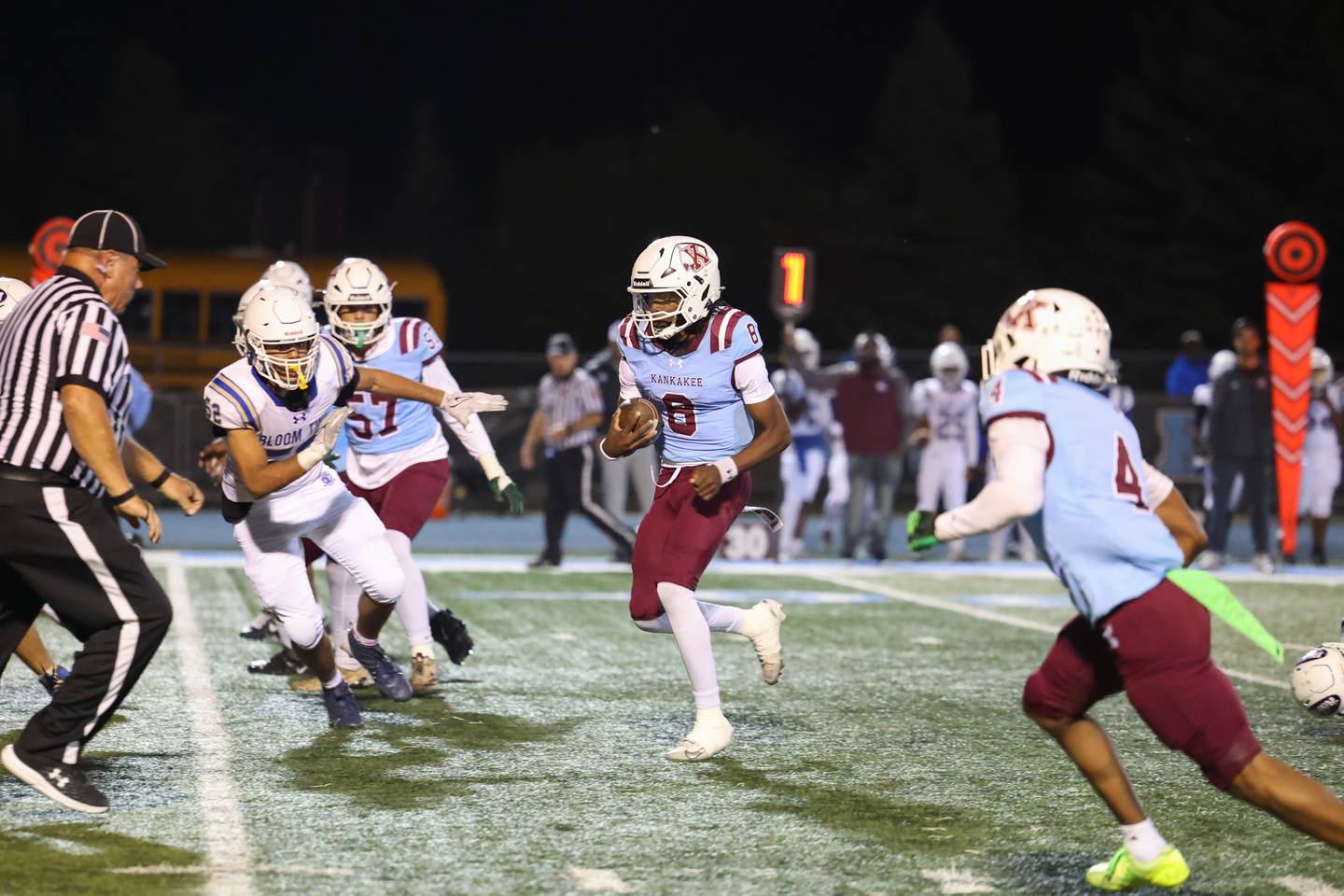 Kankakee quarterback Phillip Turner runs for a first down during the Kay's victory over Bloom on Friday, Oct. 10, 2025.