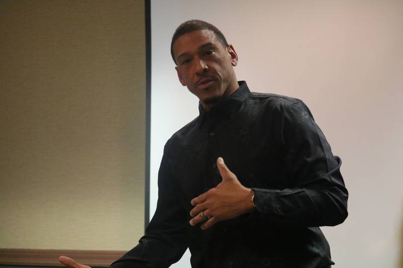 DeKalb 7th Ward Alderman John Walker gives remarks Oct. 24, 2024 at his ward meeting.