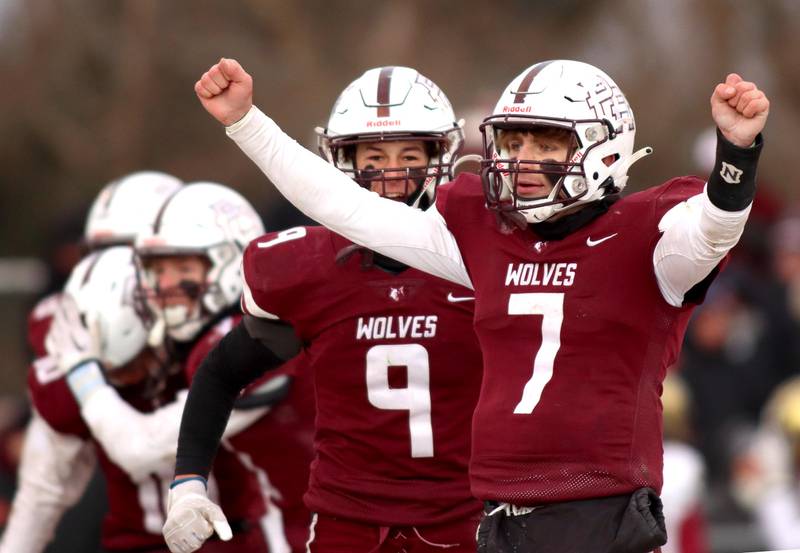 Prairie Ridge’s Joseph Vanderwiel, left, and Tyler Vasey celebrate a win over St. Ignatius in a Class 6A semifinal game Saturday in Crystal Lake.