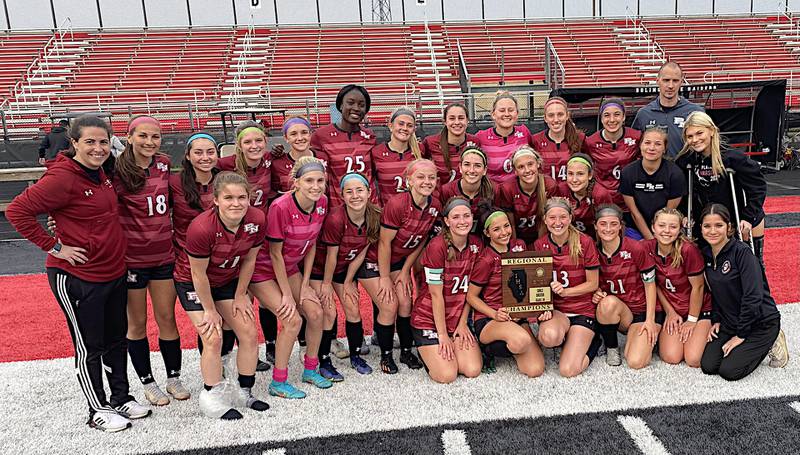 Plainfield North shows off the plaque after winning the Class 3A Bolingbrook Regional with a 7-0 win over Waubonsie Valley on Friday. It was the first regional title for North since 2015.