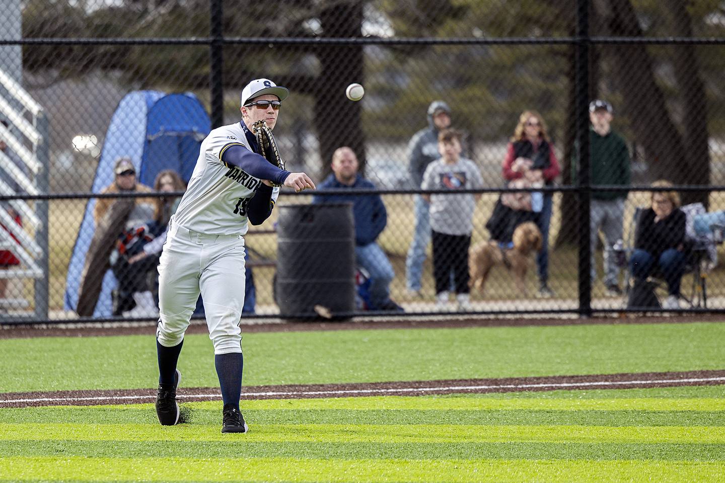 Sterling's Mason Smithee fires the ball to first on a bunt against Erie-Prophetstown Wednesday, March 15, 2023.