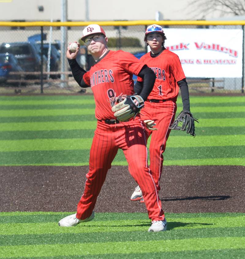 Erie-Prophetstown Braylon Swertzfeger thiows to first for an out during a game with Sterling on Saturday, March 22, 2025 at Gartner Park in Sterling.