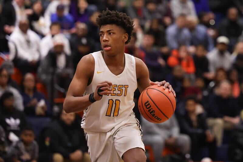 Joliet West’s Jeremy Fears looks for a play against Romeoville on Tuesday January 31st, 2023.