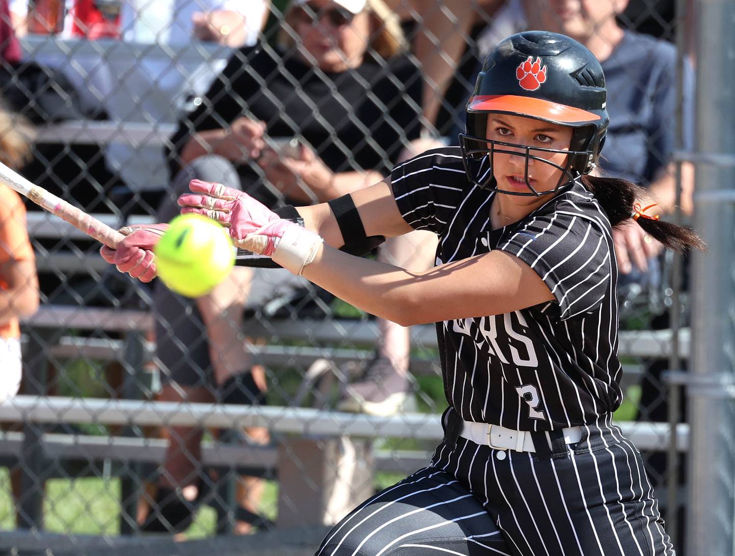 Crystal Lake Central's Ella Arana watches the ball travel after making contact Friday, June 6, 2025, during their Class 3A sectional final game against Prairie Ridge at Sycamore High School.